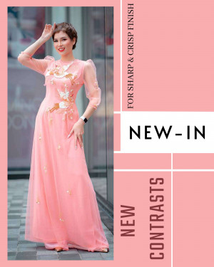 Woman wearing a long peach gown with floral embroidery