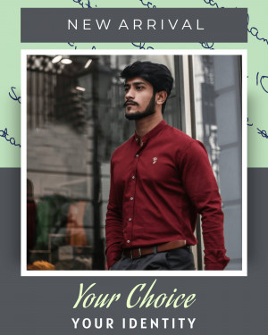 A stylish man wearing a maroon long-sleeved shirt.