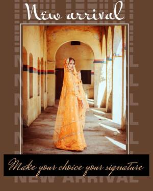 Woman in orange traditional attire standing in a corridor