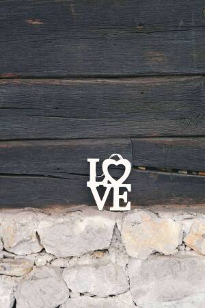 Love Sign On Wooden Wall Creative Design For Twitter
