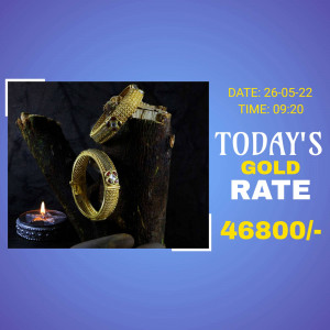 Gold jewelry displayed with current gold rate information