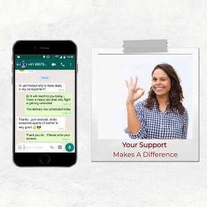 Smartphone displaying a WhatsApp conversation about a delivery update with a customer giving a thumbs up.