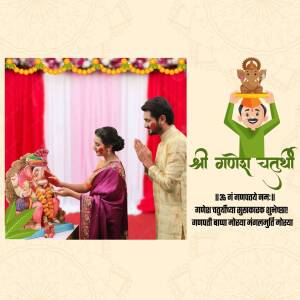 Indian couple performing aarti during Ganesh Chaturthi festival