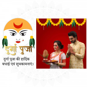 A couple celebrating Durga Puja with a traditional thali and a depiction of Goddess Durga.