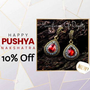 Gold earrings with red gemstones on a dark background with Pushya Nakshatra sale promotion.
