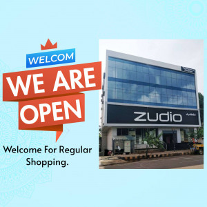 Zudio store front with a 'We Are Open' banner.