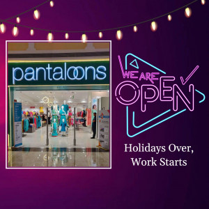 Pantaloons store front with 'We Are Open' neon sign.