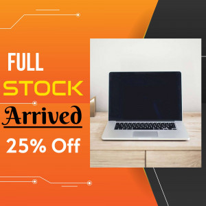 Laptop on a desk with a sale announcement