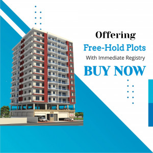 Modern apartment building with advertisement for free-hold plots
