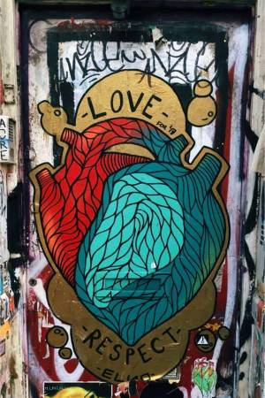 Graffiti art of a heart with the words 'Love' and 'Respect'