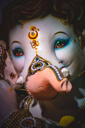 Detailed close-up of a beautifully decorated Ganesha idol