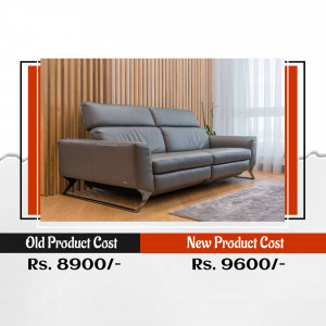 Grey leather sofa with recliners and price comparison of old and new product cost.