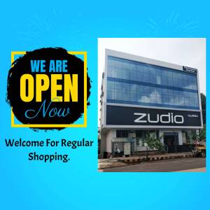 Zudio store front with 'We Are Open' announcement