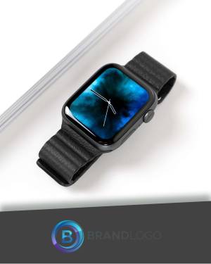 Close-up of a black smartwatch with a leather band on a white surface.