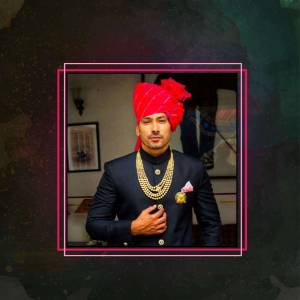 A portrait of a man in traditional Rajput attire.