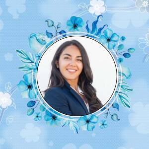 Woman in a suit with a floral border