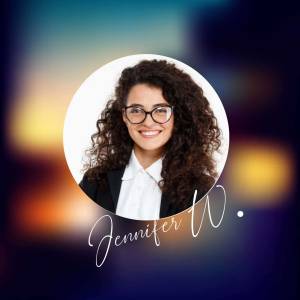 Portrait of Jennifer W., a woman with curly hair wearing glasses and a blazer.