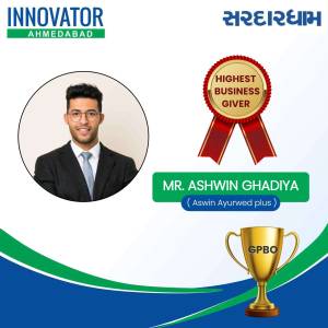 Portrait of Mr. Ashwin Ghadiya with awards and branding for Innovator Ahmedabad and Sardar Dham.