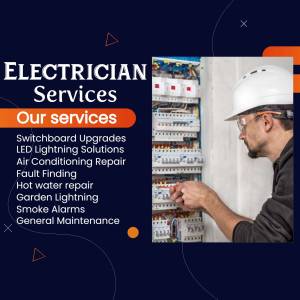Electrician working on a switchboard with a list of services