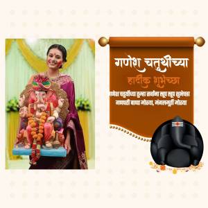 Woman in traditional attire with Ganesh idol for Ganesh Chaturthi