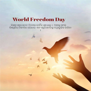 Image depicting birds flying towards a hand under a sunset sky with text 'World Freedom Day'.