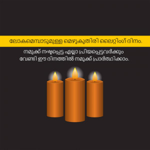 Three lit candles on a dark background with Malayalam text.