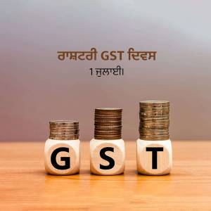 Stacks of coins with GST letters on wooden blocks