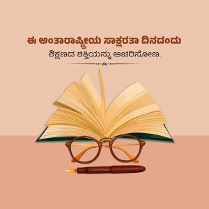 Open book with glasses and pen, celebrating International Literacy Day