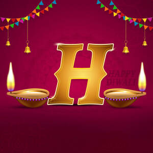 Golden letter H with Diwali decorations