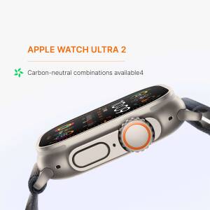 Close-up of the Apple Watch Ultra 2 with a brown band, showcasing the display and side buttons.