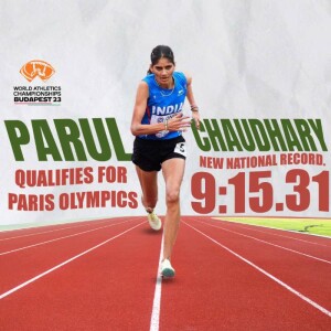 Parul Chaudhary, an Indian athlete, running on a track with the World Athletics Championships Budapest 23 banner in the background.