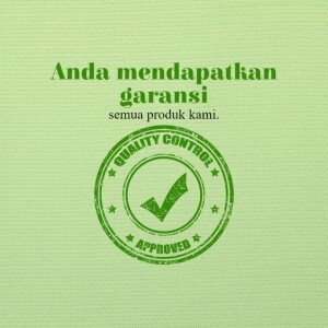 Green stamp with a checkmark and text in Indonesian about product warranty.