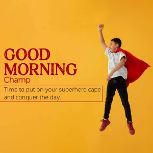 A young boy jumping in the air wearing a red superhero cape with the text 'Good Morning Champ'