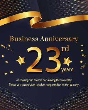 Golden ribbon and number 23rd with confetti celebrating a business anniversary.