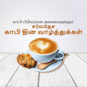 A cup of coffee with latte art and a biscuit on a wooden surface.