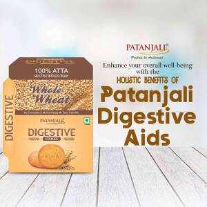 Patanjali Digestive Aatta and Cookies packaging with text promoting holistic benefits.