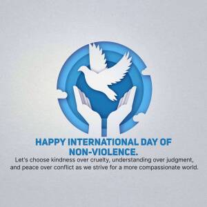 Image depicting a white dove above cupped hands with the text 'Happy International Day of Non-Violence'