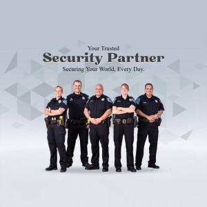 Group of security professionals in uniform standing confidently.
