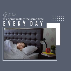 Woman sleeping in bed with alarm clock, promoting a regular sleep schedule.