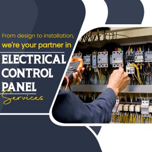 Electrician working on an electrical control panel