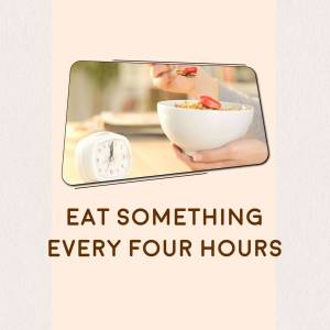 Image of a hand holding a bowl of food with a clock, promoting regular eating.