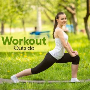 Woman stretching outdoors in a park