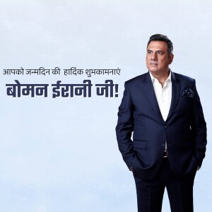 Boman Irani in a suit with birthday greetings in Hindi
