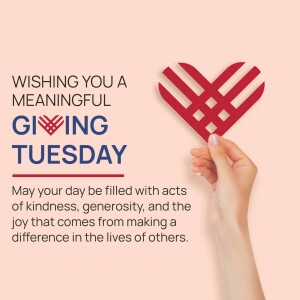 Hand holding a red heart symbol with text wishing a meaningful Giving Tuesday
