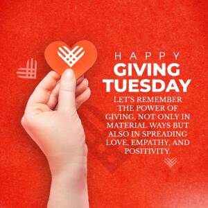 Hand holding a heart-shaped card with the Giving Tuesday logo on a red background.