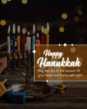 A lit Hanukkah menorah with a 'Happy Hanukkah' greeting.