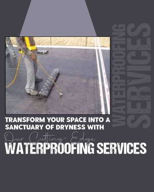 Worker applying waterproofing membrane to a flat roof