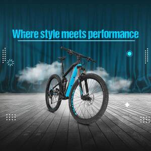 Blue and black electric mountain bike on a stage with dramatic lighting