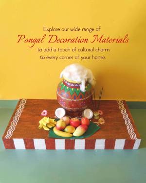 Pongal decoration setup with pot, fruits, and flowers