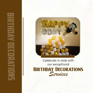 Birthday decorations with balloons, lights, and a bottle of champagne.